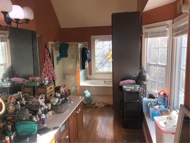 a room with lots of furniture and clutter