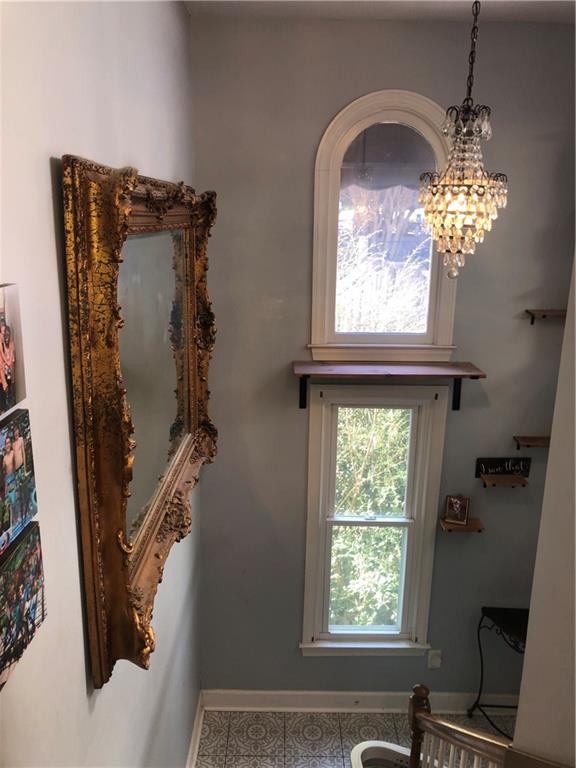 4532 High Rock Terrace Marietta, GA 30066 - Photo 17 of 40 a view of a windows and a chandelier in a room