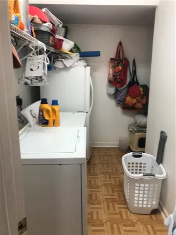 a kitchen with a stove and a refrigerator