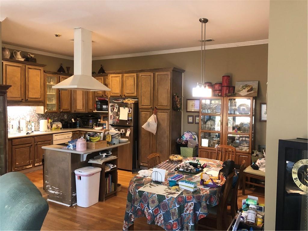4532 High Rock Terrace Marietta, GA 30066 - Photo 31 of 40 a kitchen with stainless steel appliances granite countertop a sink stove and refrigerator