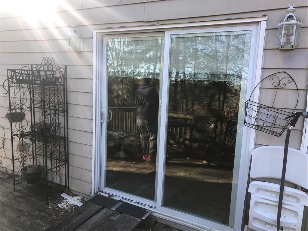 4532 High Rock Terrace Marietta, GA 30066 - Photo 34 of 40 a bathroom with a glass shower door