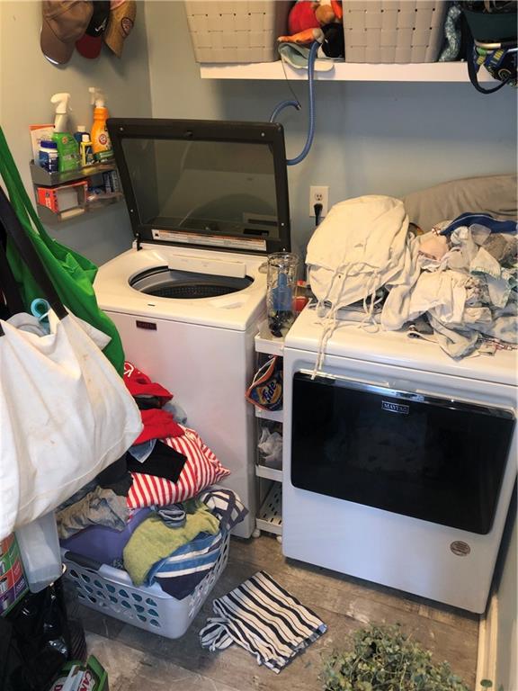4532 High Rock Terrace Marietta, GA 30066 - Photo 8 of 40 a room with stainless steel appliances kitchen island granite countertop a stove and a microwave