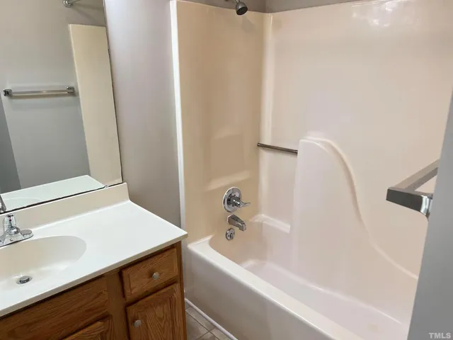 a bathroom with a sink and a bathtub