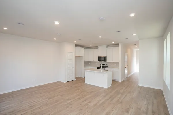 a view of kitchen with wooden floor