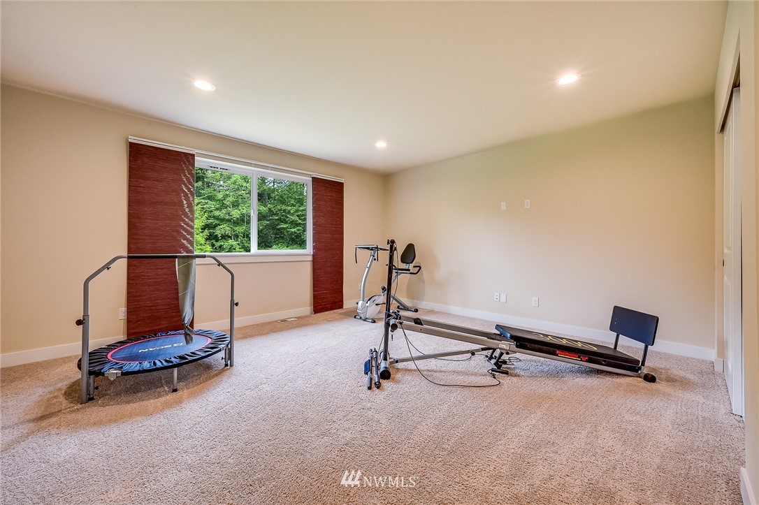18924 10th Drive Southeast Bothell, WA 98012 - Photo 14 of 28 a view of a room with gym equipment