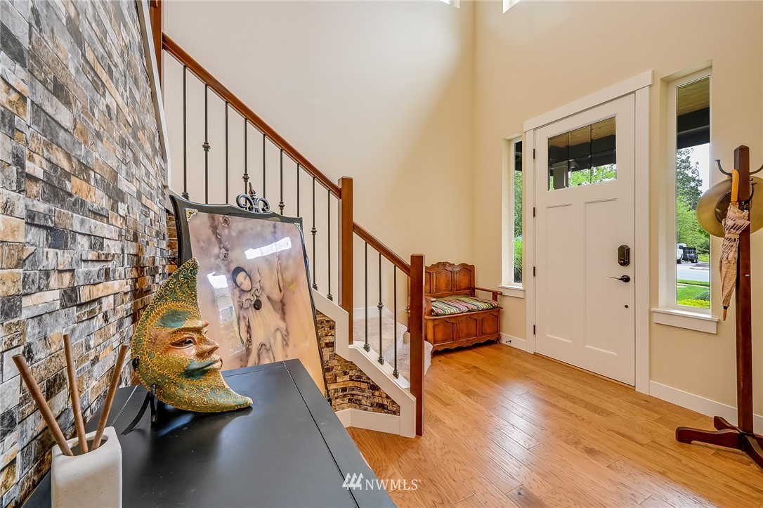 18924 10th Drive Southeast Bothell, WA 98012 - Photo 3 of 28 a view of entryway with wooden floor and stairs