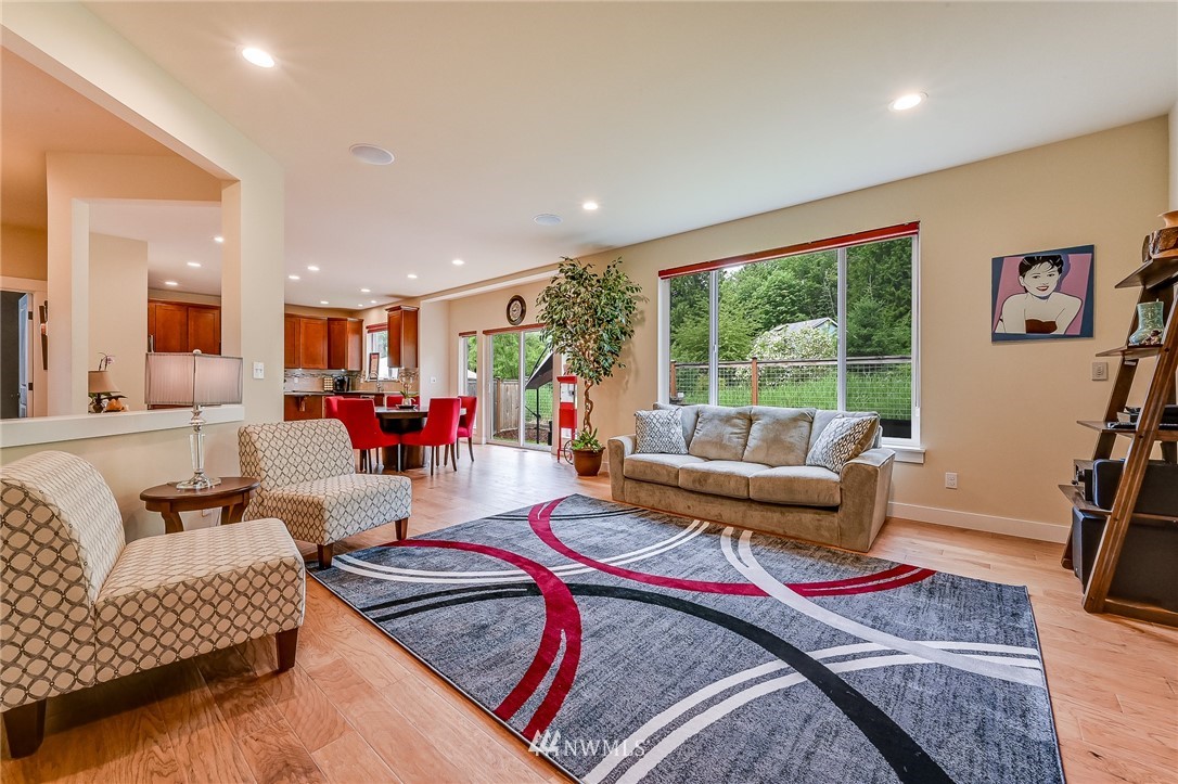 18924 10th Drive Southeast Bothell, WA 98012 - Photo 5 of 28 a living room with furniture and a large window