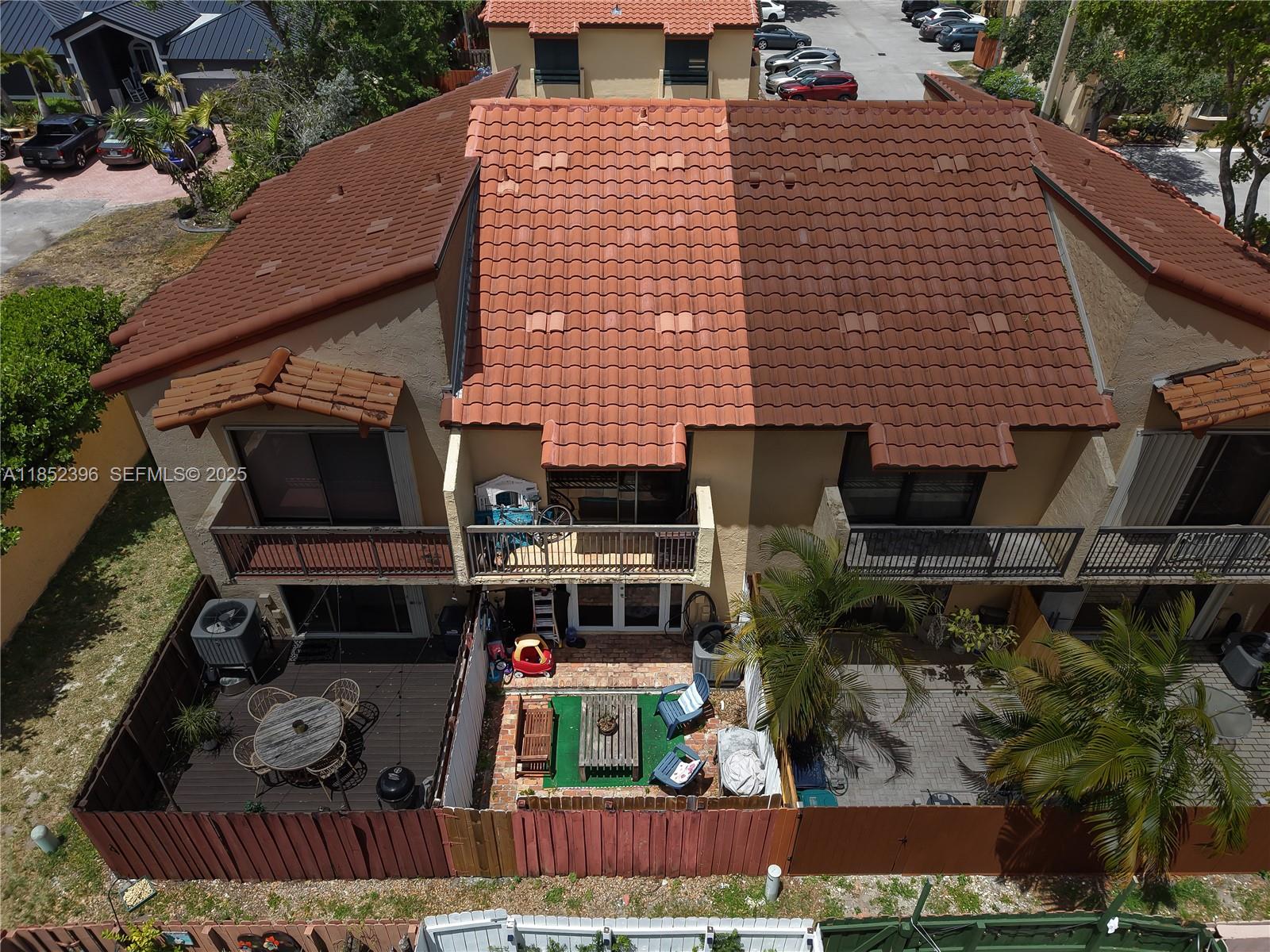 10194 Southwest 77th Court Miami, FL 33156 - Photo 17 of 25 a front view of a house with a yard