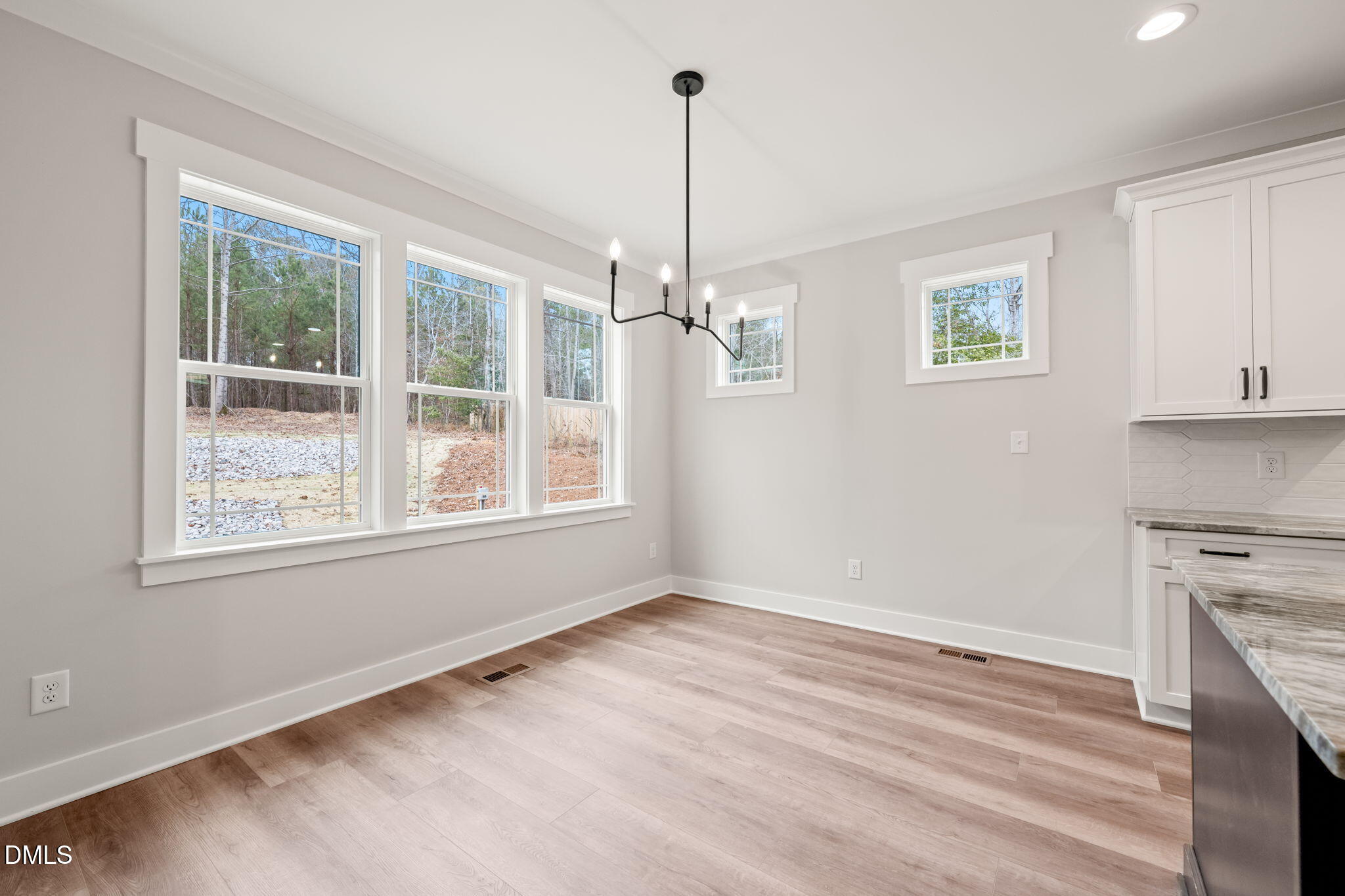 160 Pilot Ridge Road Zebulon, NC 27597 - Photo 11 of 49 a view of empty room with window and ceiling fan