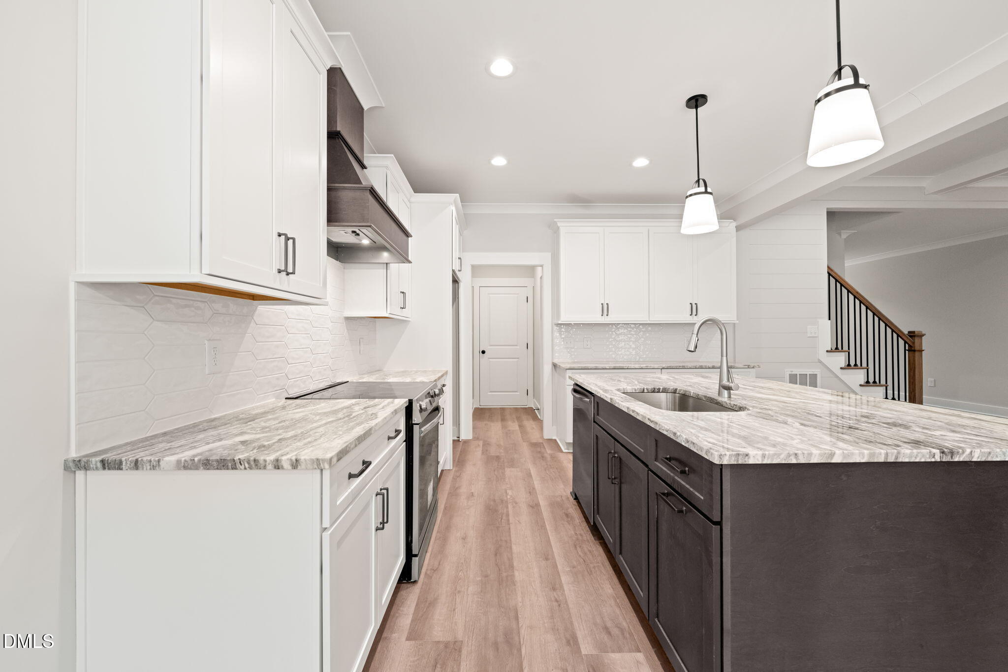 160 Pilot Ridge Road Zebulon, NC 27597 - Photo 13 of 49 a kitchen with a stove sink and cabinets