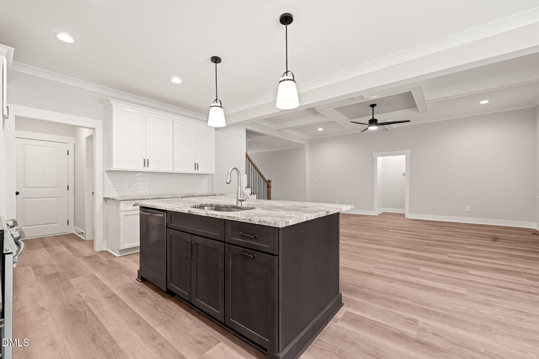 160 Pilot Ridge Road Zebulon, NC 27597 - Photo 14 of 49 a kitchen with a sink cabinets and wooden floor
