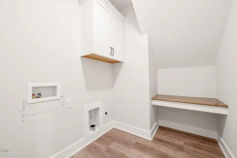 a view of entryway with wooden floor