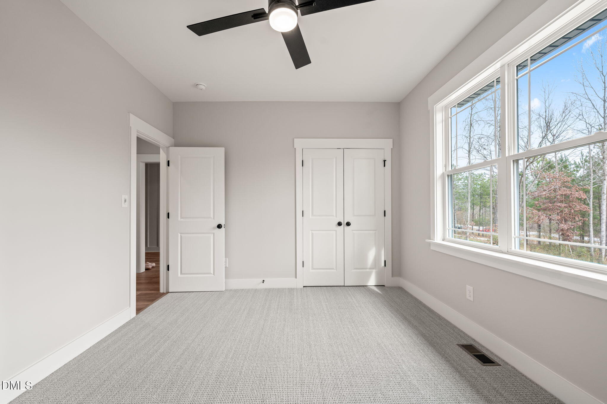 160 Pilot Ridge Road Zebulon, NC 27597 - Photo 28 of 49 a view of an empty room with a window