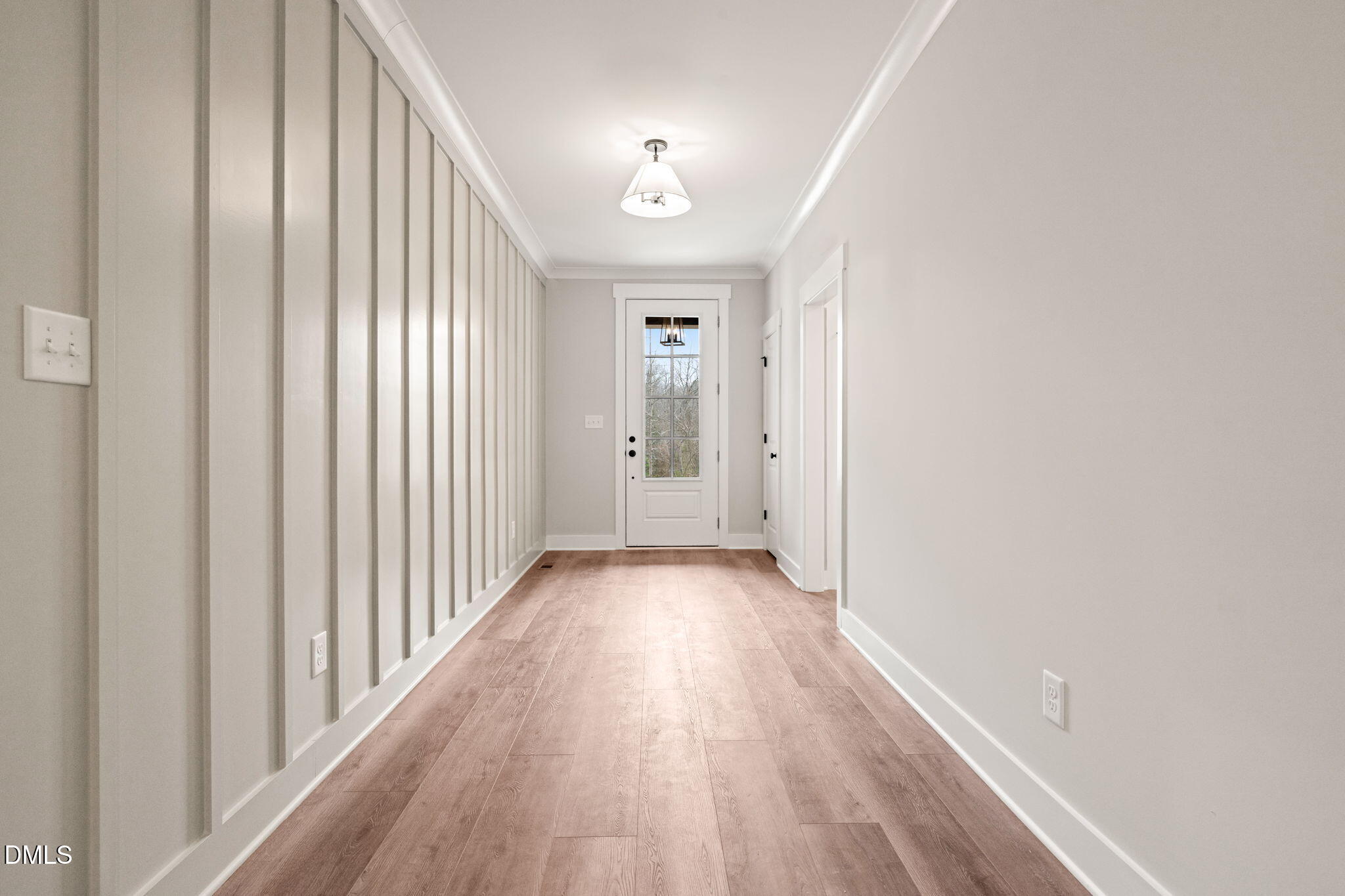 160 Pilot Ridge Road Zebulon, NC 27597 - Photo 4 of 49 a view of a hallway with wooden floor