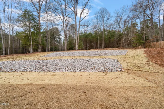 a view of a yard covered with snow