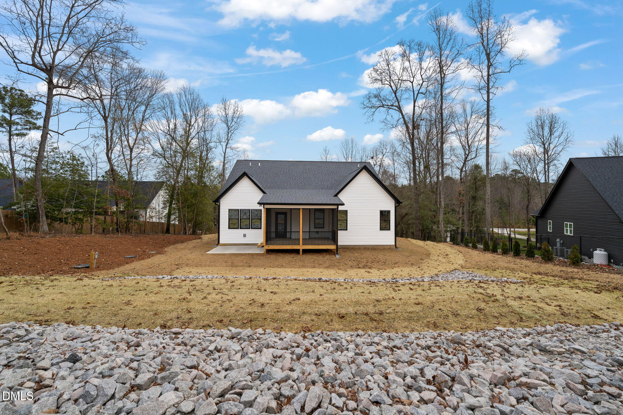 160 Pilot Ridge Road Zebulon, NC 27597 - Photo 43 of 49 a front view of a house with a yard covered in snow
