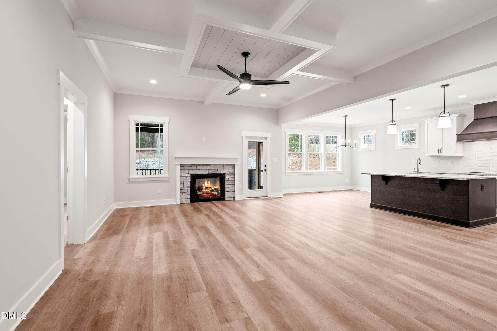160 Pilot Ridge Road Zebulon, NC 27597 - Photo 6 of 49 a view of an empty room with a fireplace and a window