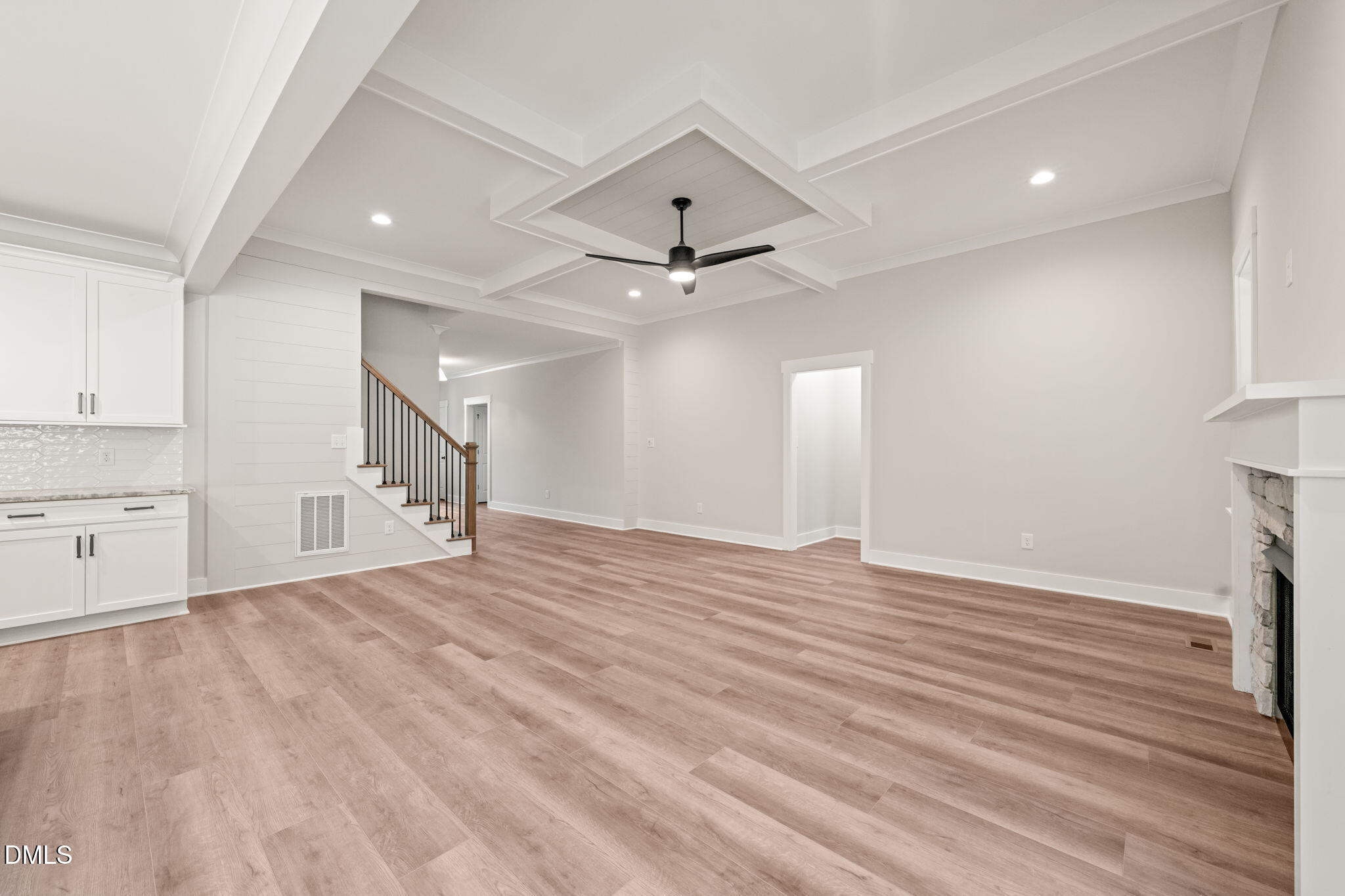 160 Pilot Ridge Road Zebulon, NC 27597 - Photo 8 of 49 a view of an empty room with a window and a kitchen