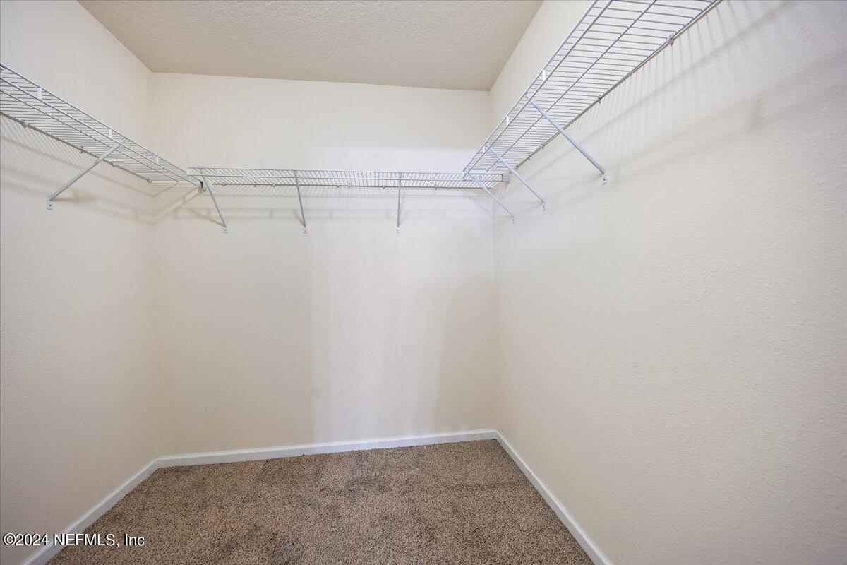65053 Lagoon Forest Drive Yulee, FL 32097 - Photo 11 of 19 a view of an empty walk in closet