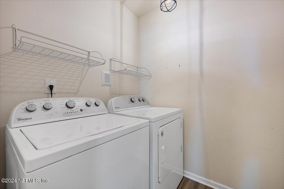 65053 Lagoon Forest Drive Yulee, FL 32097 - Photo 16 of 19 a utility room with dryer and washer
