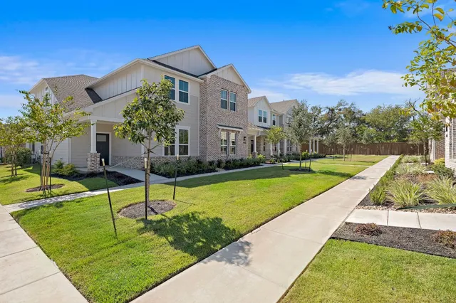 a house with garden in front of it