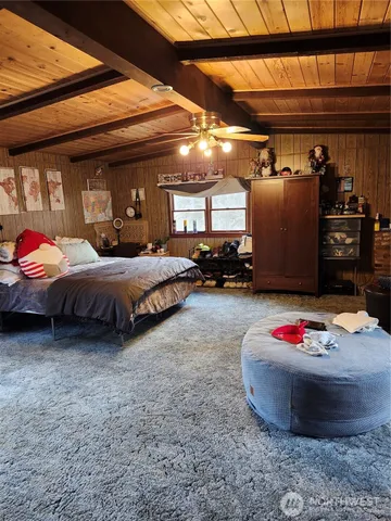 a bed room with furniture and a window