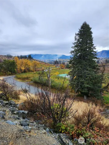 a view of lake with green space
