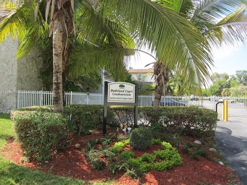 7483 Southwest 82nd Street, Unit A207 Miami, FL 33143 - Photo 19 of 27 a view of a street with a building in front of it