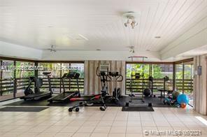 7483 Southwest 82nd Street, Unit A207 Miami, FL 33143 - Photo 23 of 27 a view of a room with gym equipment