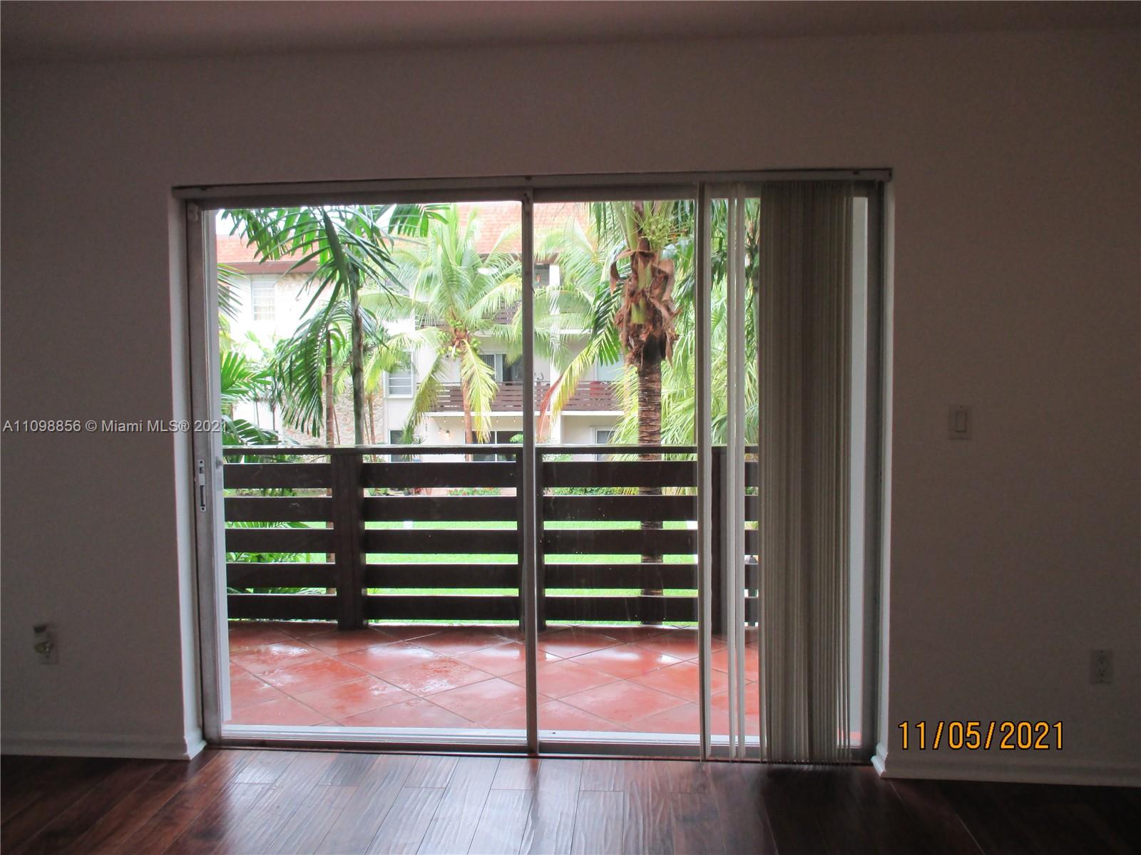 7483 Southwest 82nd Street, Unit A207 Miami, FL 33143 - Photo 3 of 27 a view of a room with a large window