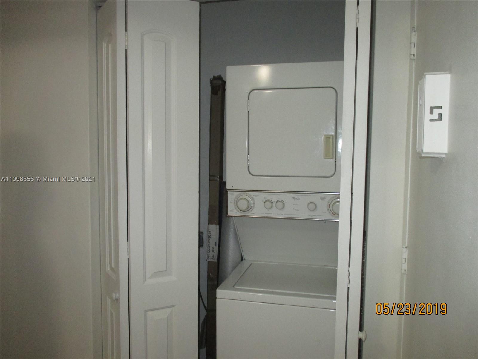 7483 Southwest 82nd Street, Unit A207 Miami, FL 33143 - Photo 8 of 27 a utility room with dryer and washer