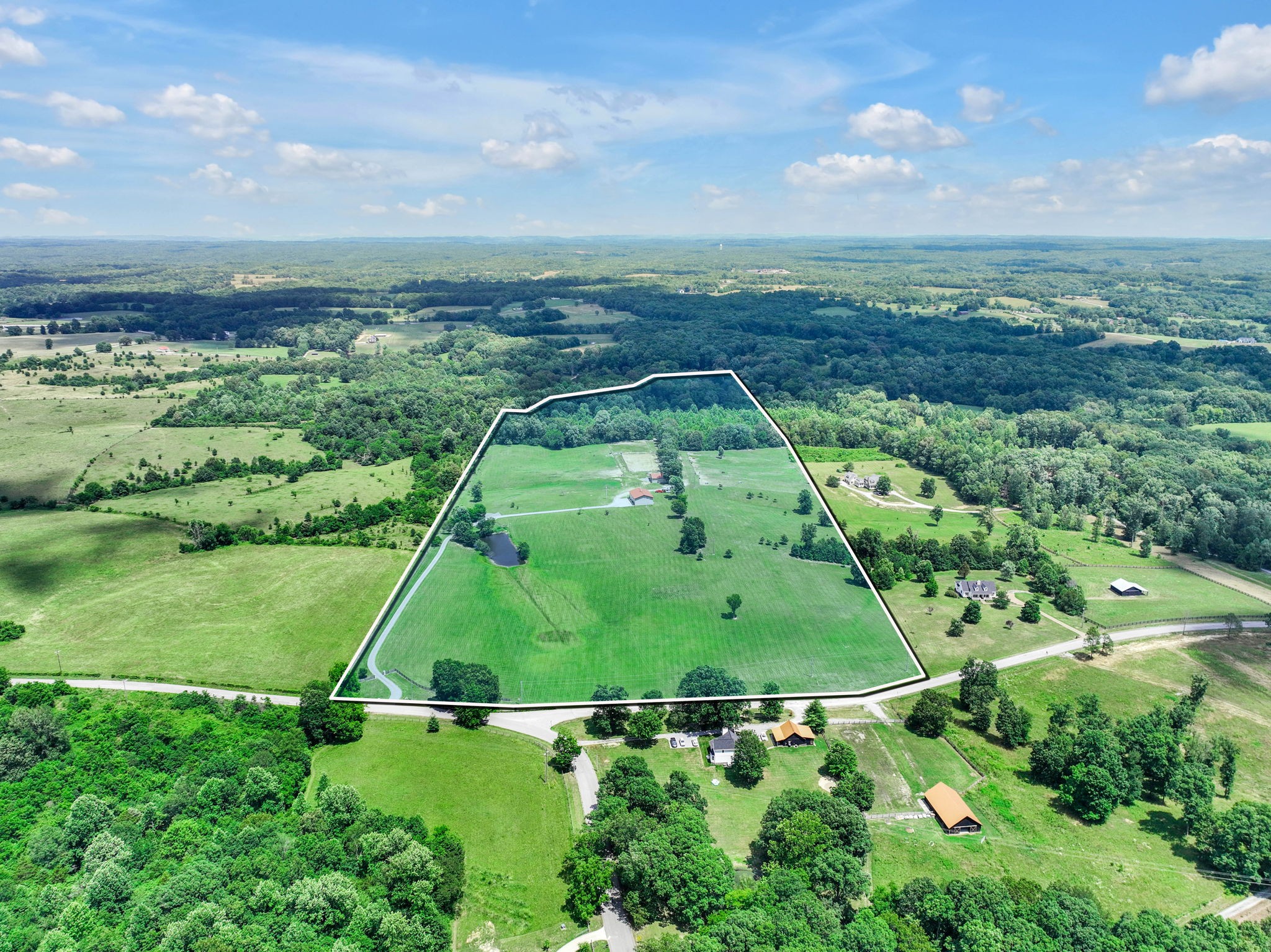 7762 Lampley Road Primm Springs, TN 38476 - Photo 54 of 55 an aerial view of a residential houses