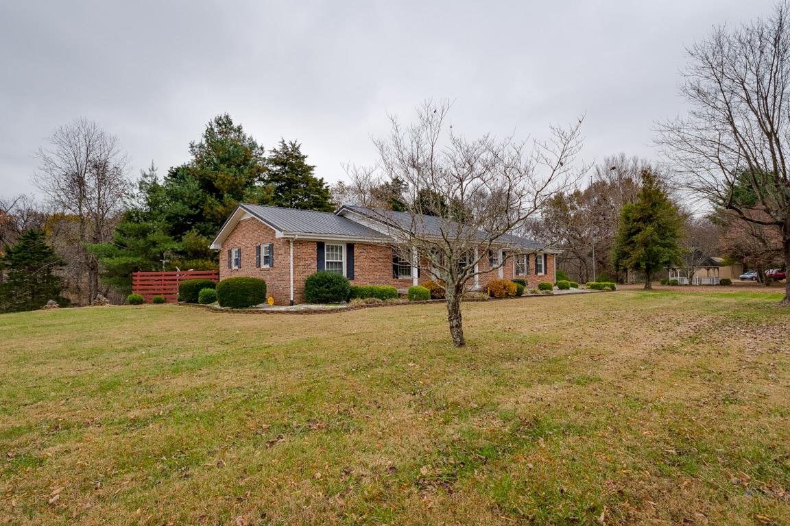 4125 Cross Plains Road Springfield, TN 37172 - Photo 3 of 30 a front view of house with yard and trees