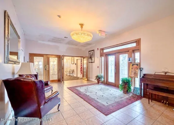 a view of a living room and kitchen