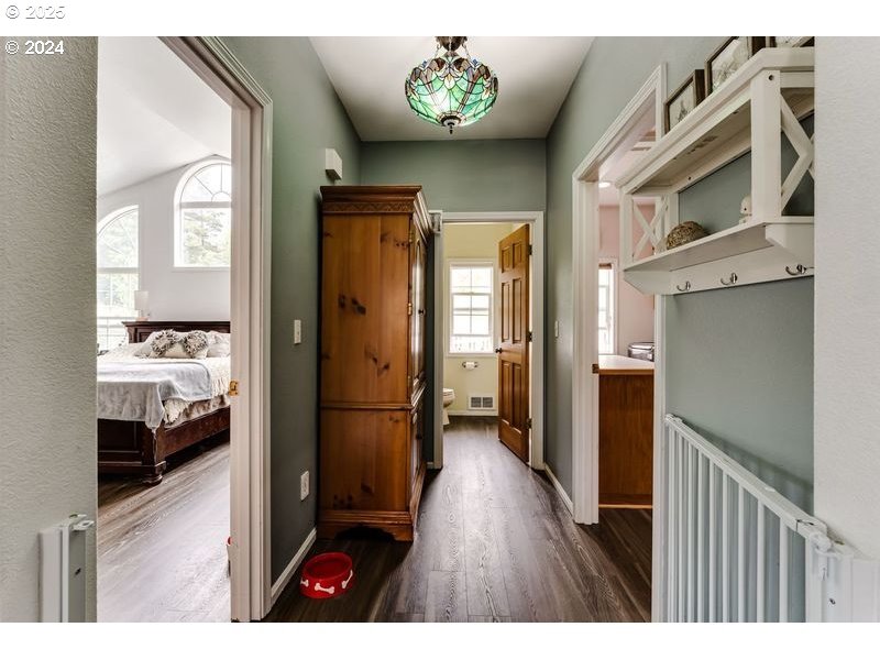 36 Ocean Dunes Drive Florence, OR 97439 - Photo 18 of 40 a view of a hallway view with wooden floor and living room