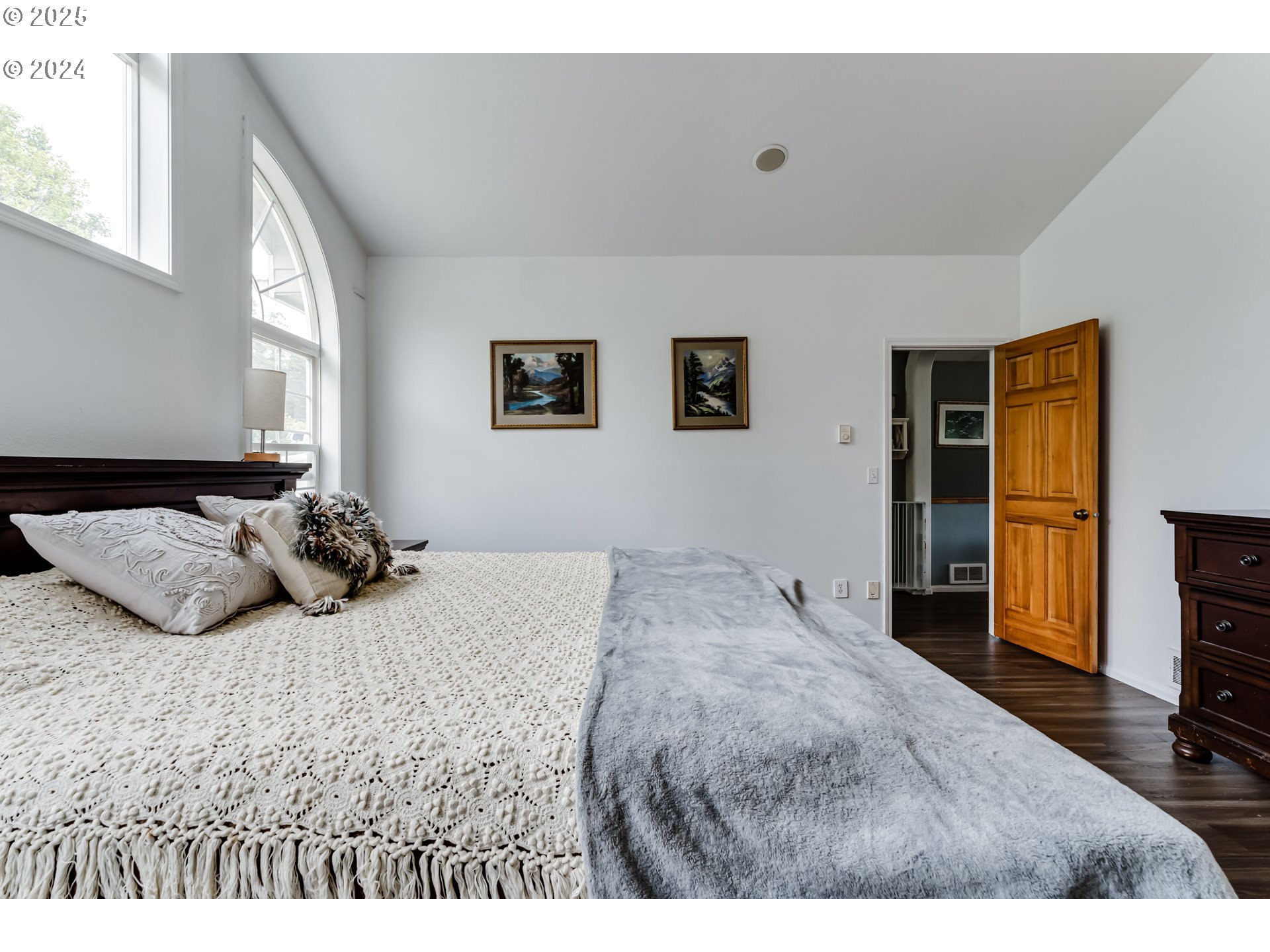 36 Ocean Dunes Drive Florence, OR 97439 - Photo 24 of 40 a bedroom with a bed and a television