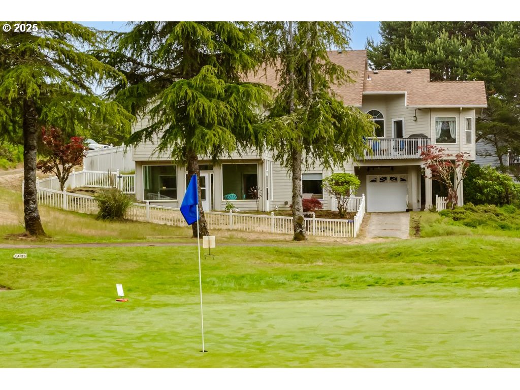 36 Ocean Dunes Drive Florence, OR 97439 - Photo 4 of 40 a view of a house with a swimming pool