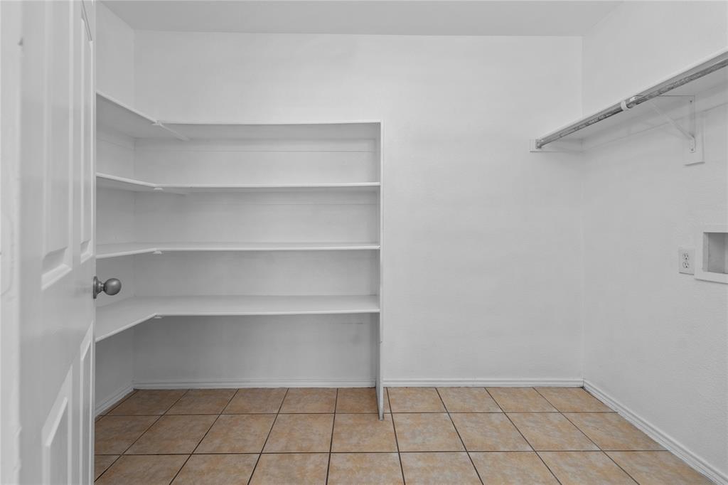 3256 Torio Grand Prairie, TX 75054 - Photo 12 of 17 a view of a room with shelf