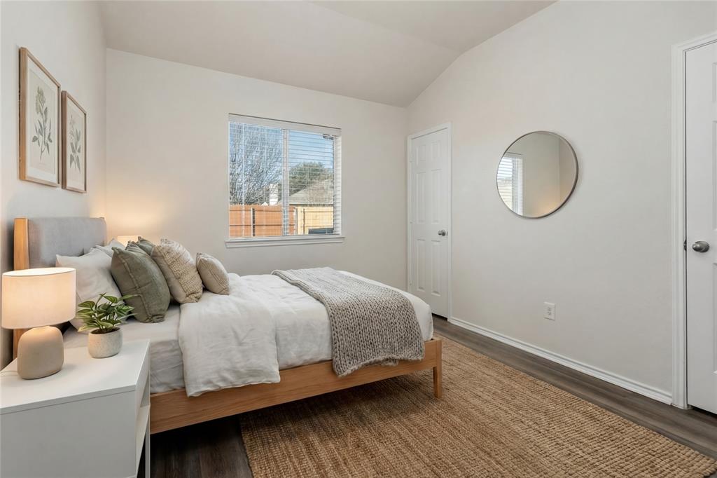 3256 Torio Grand Prairie, TX 75054 - Photo 7 of 17 a bedroom with bed and a window