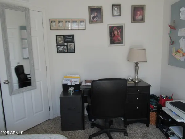 a room with furniture and a window