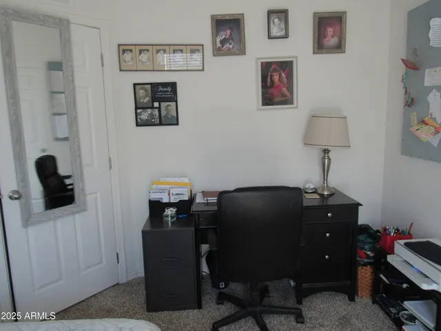 a room with furniture and a window