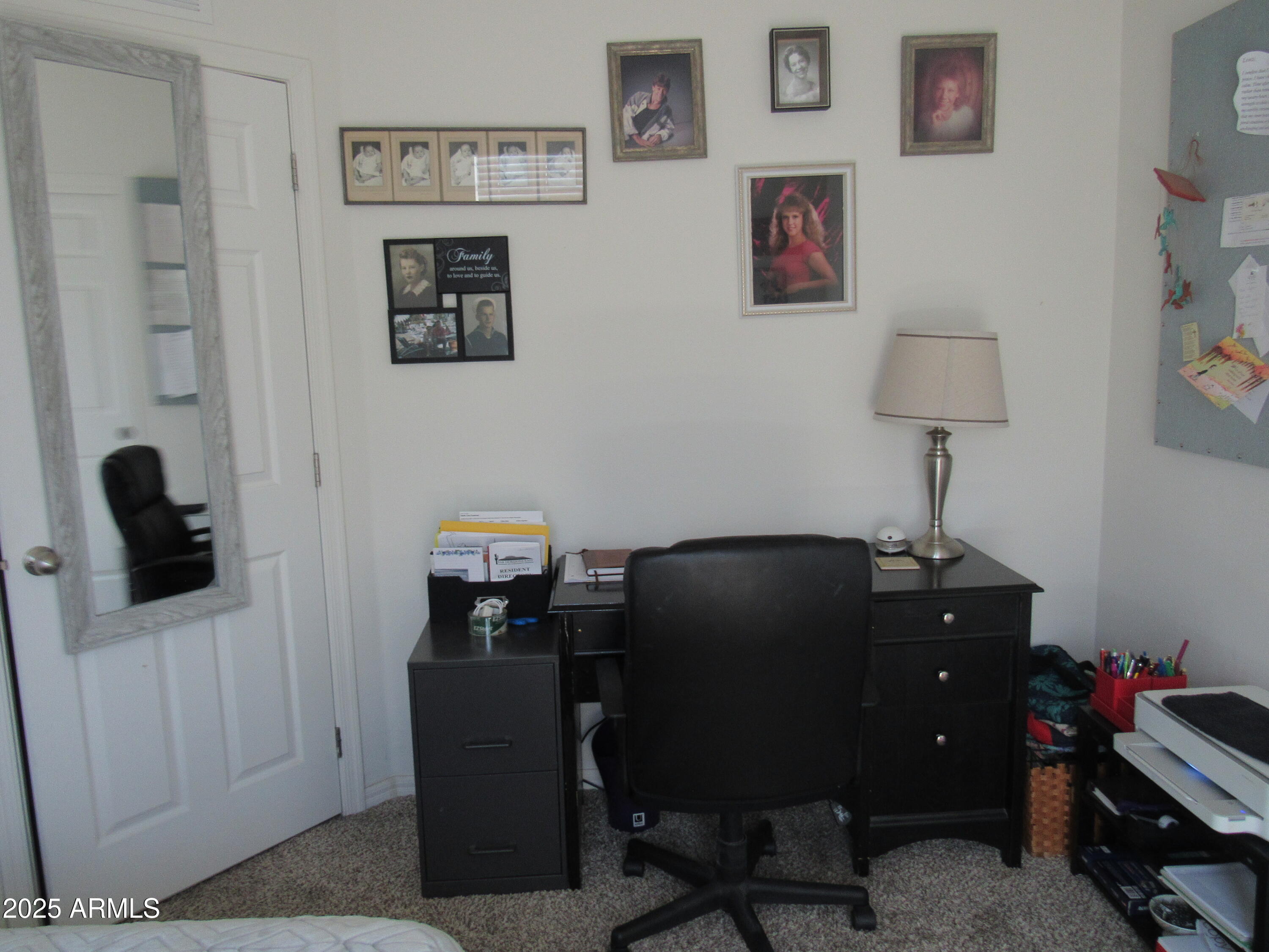 7570 East Speedway Boulevard, Unit 573 Tucson, AZ 85710 - Photo 11 of 16 a room with furniture and a window