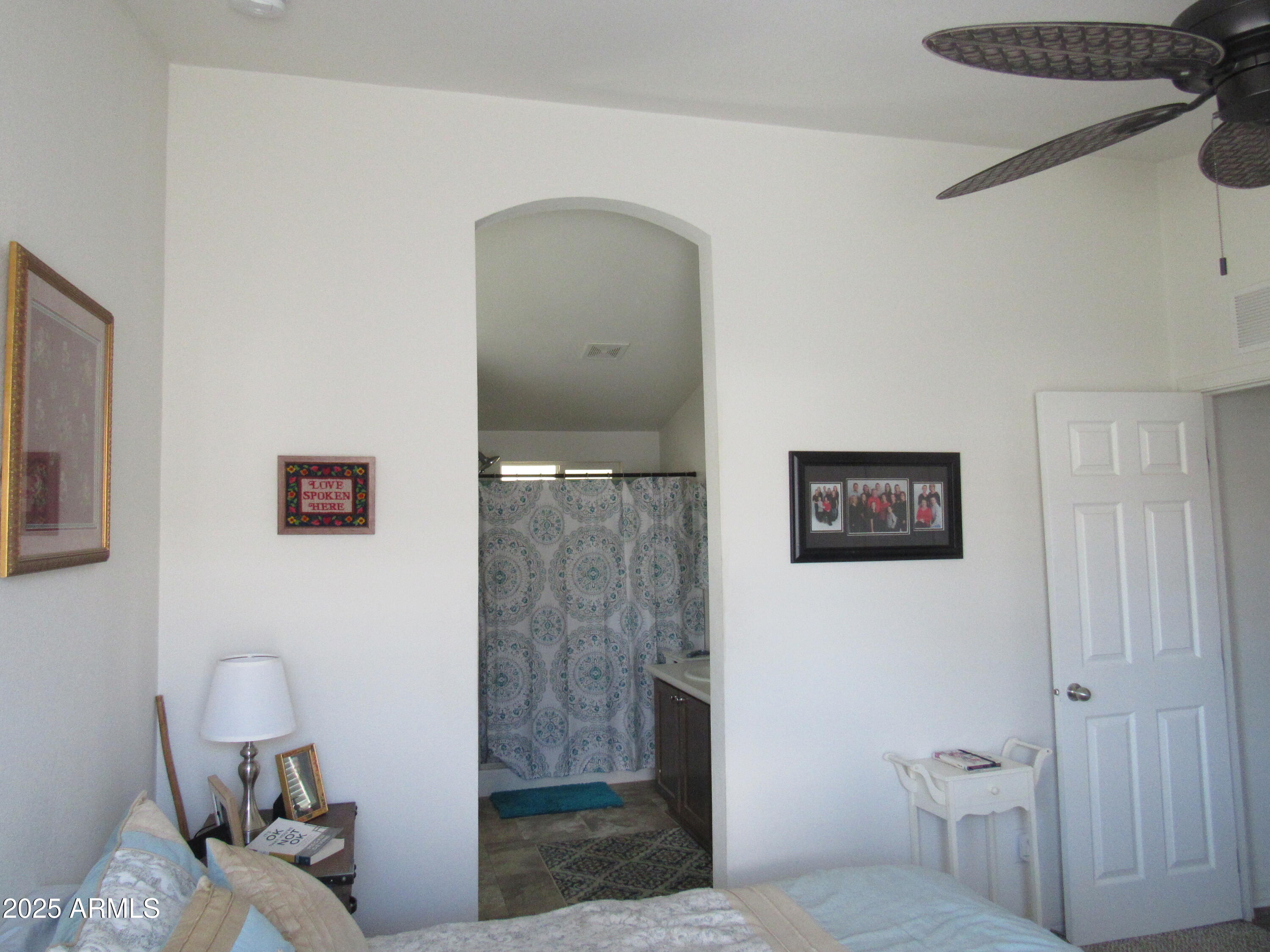 7570 East Speedway Boulevard, Unit 573 Tucson, AZ 85710 - Photo 15 of 16 a bathroom with a toilet and a shower