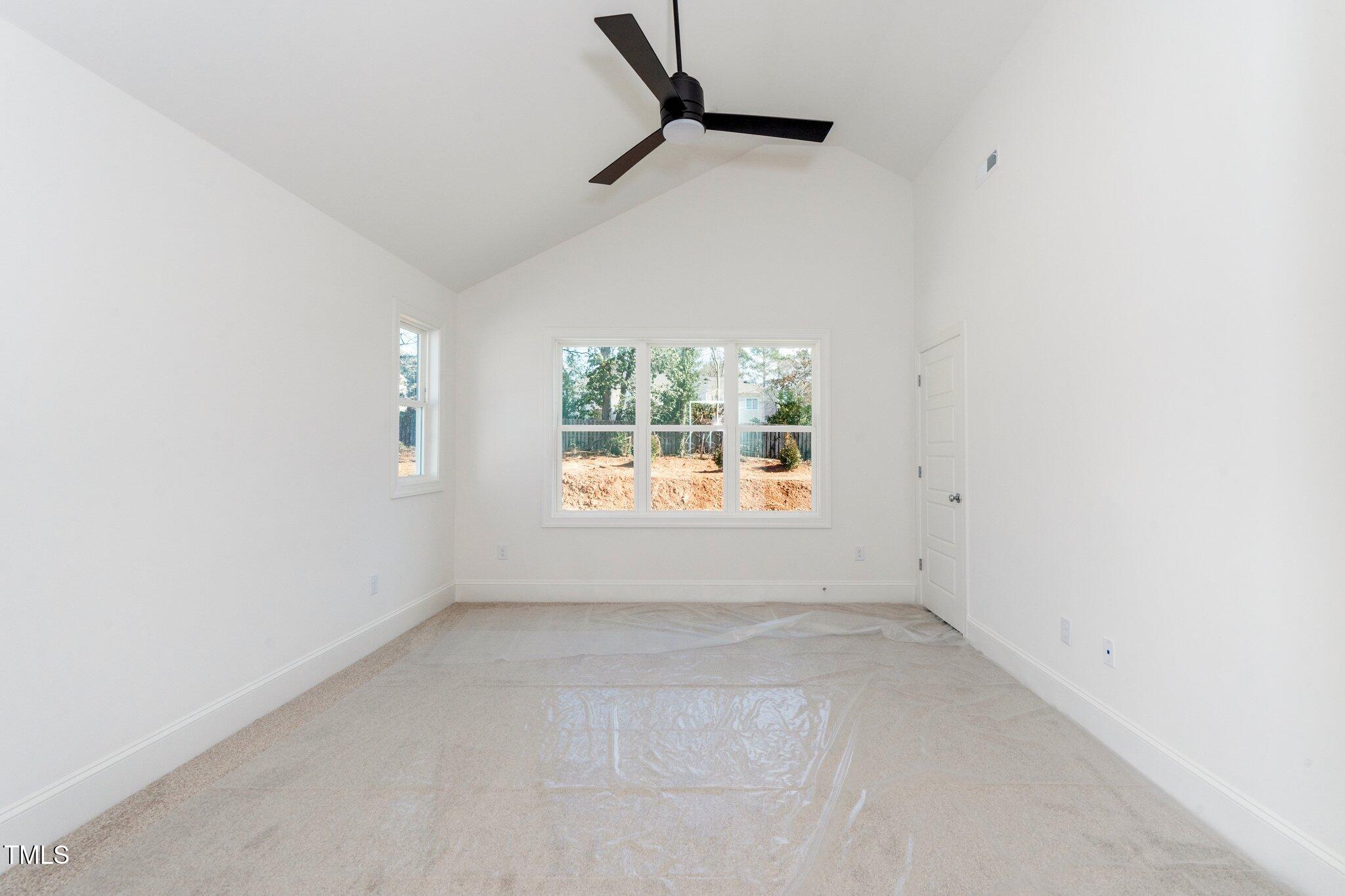 1215 Chaney Road Raleigh, NC 27606 - Photo 25 of 29 an empty room with windows