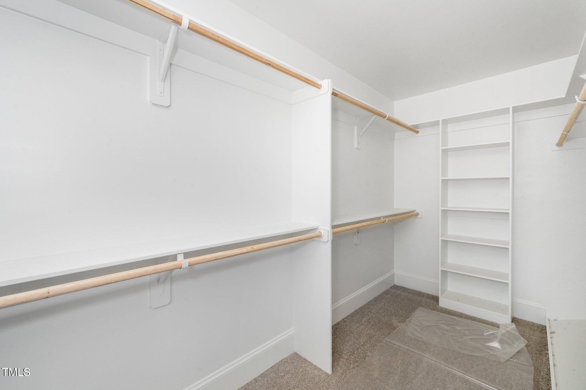 1215 Chaney Road Raleigh, NC 27606 - Photo 26 of 29 a view of an empty walk in closet