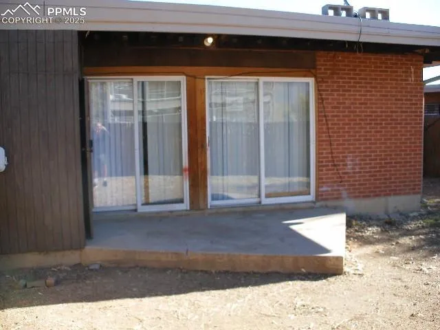 a view of outdoor space with sliding door