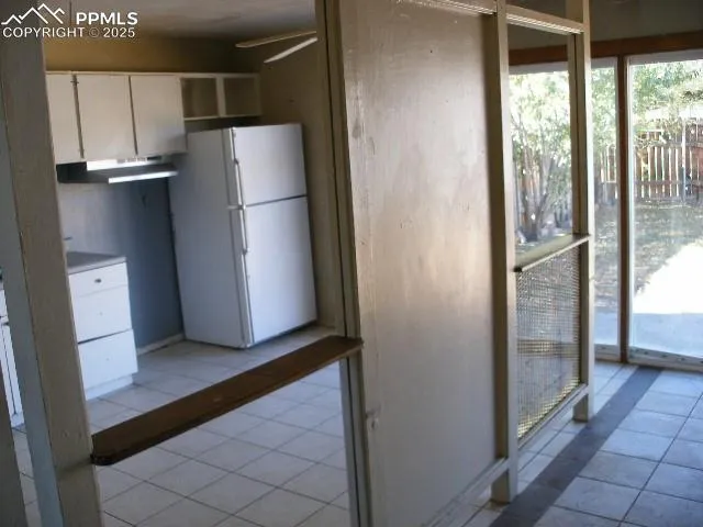 an empty room with windows