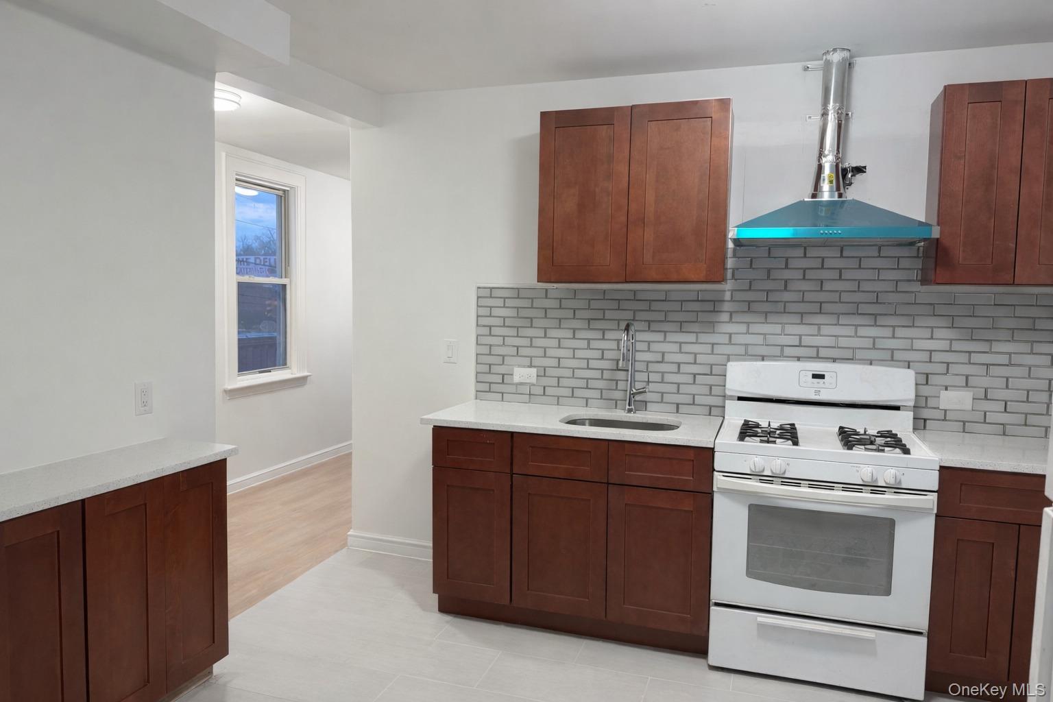 71-50 73rd Place Queens, NY 11385 - Photo 1 of 7