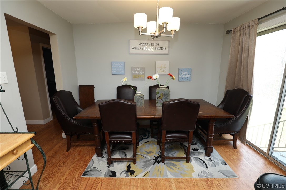 5346 Cold Harbor Road Mechanicsville, VA 23111 - Photo 16 of 42 Dining Room with hardwood floor and sliding glass