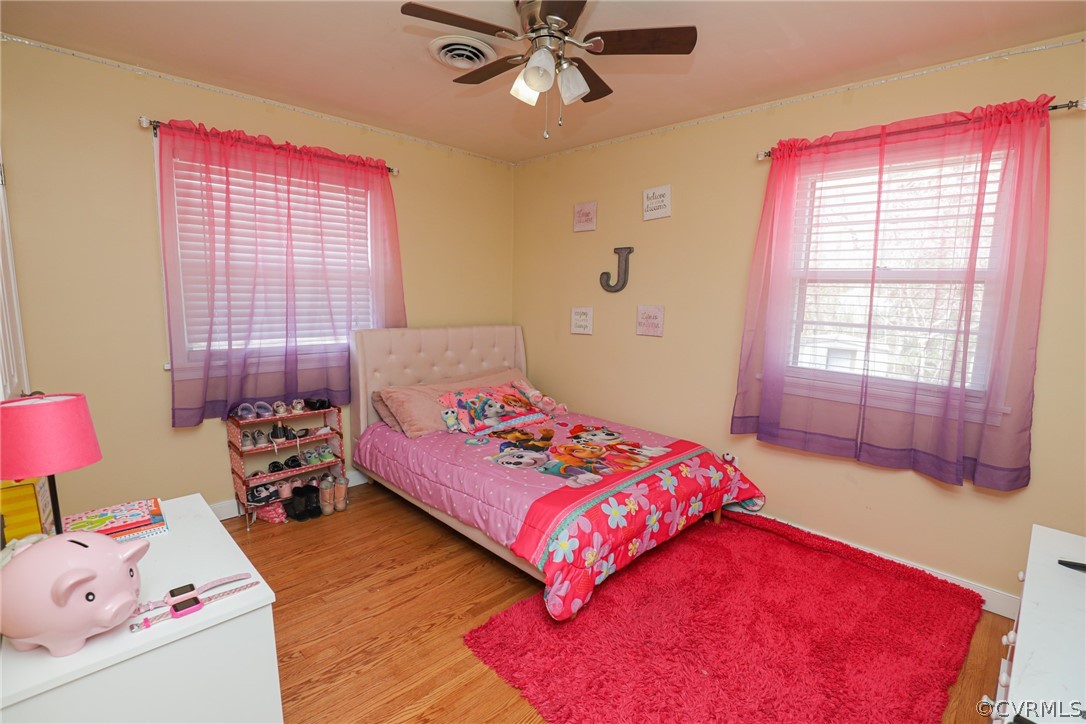 5346 Cold Harbor Road Mechanicsville, VA 23111 - Photo 25 of 42 Bedroom 2 with hardwood floor, ceiling fan, and do